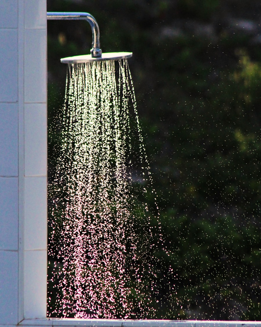 Stainless steel shower head running cold water